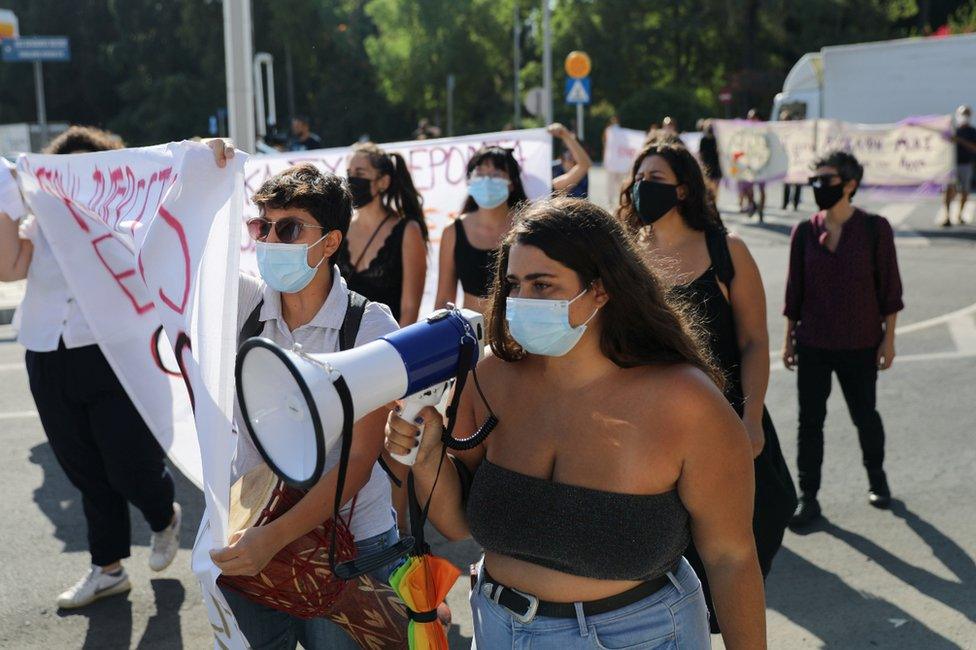 Activists demonstrate outside the Supreme Court