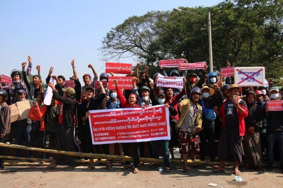 Demonstrators gesture during a protest against the military coup in Naypyitaw, Myanmar, 09 February 2021.