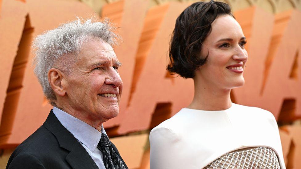 Phoebe Waller-Bridge and Harrison Ford attend the UK premiere of Indiana Jones and the Dial of Destiny at Cineworld Leicester Square on June 26, 2023 in London, England