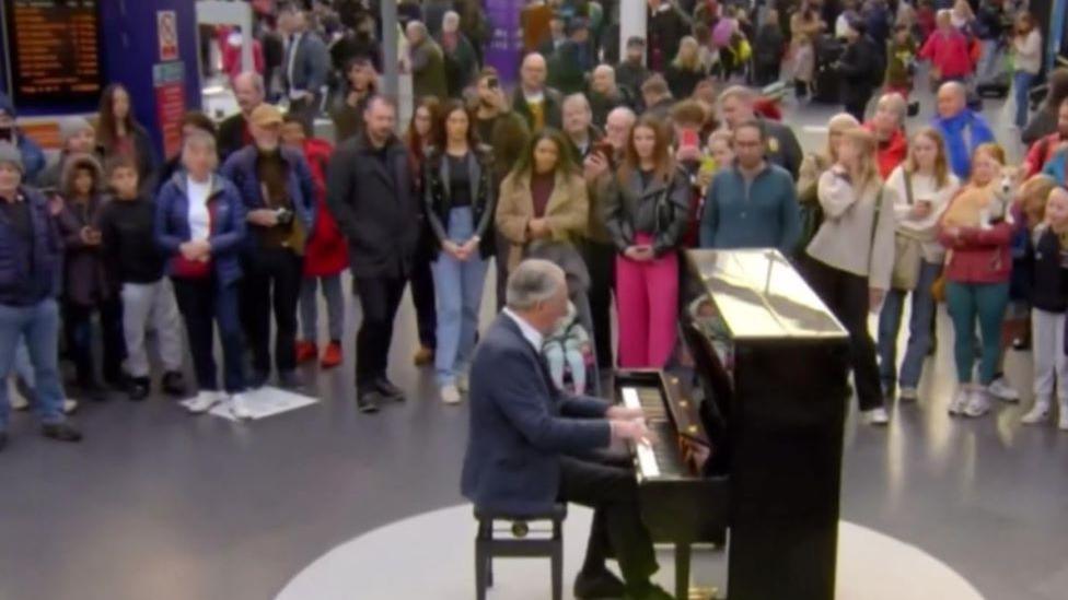 Duncan playing the piano in Manchester 