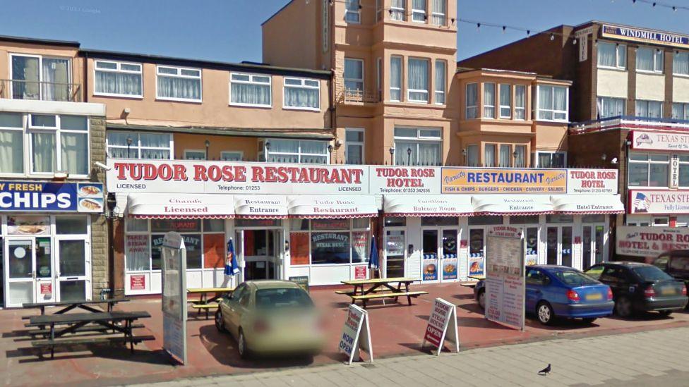 Street view of the Tudor Rose Hotel on Blackpool Promenade