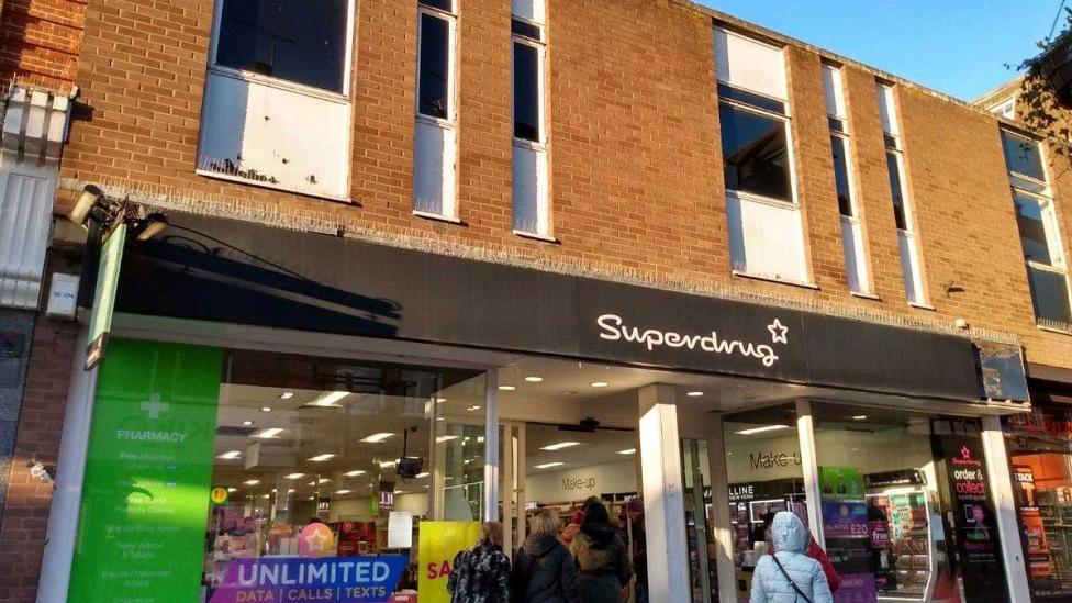 Google Street View of the building, which currently houses outlets of Superdrug and Wenzell's the bakers