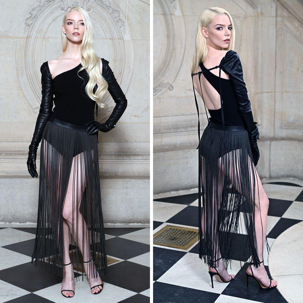 Side-by-side pictures of Anya Taylor-Joy in different poses, wearing a black dress with tassled skirt and long black gloves.