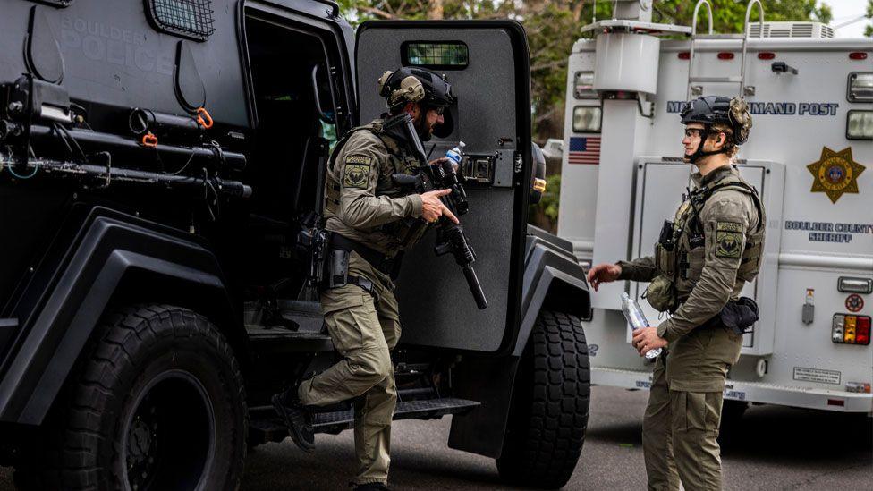 Tactical teams get into position following an incident in Colorado