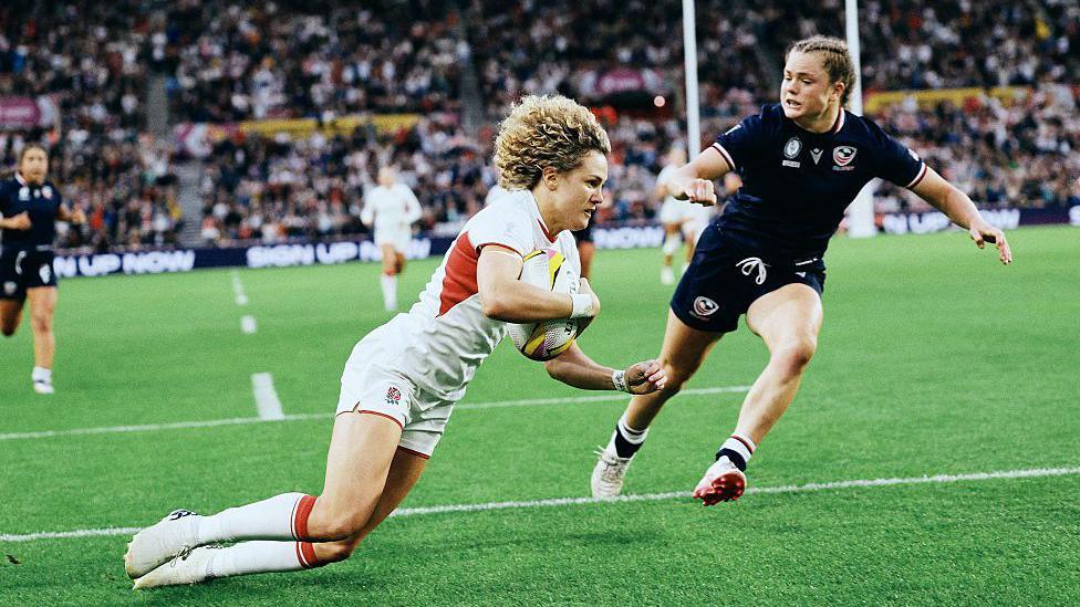 Ellie Kildunne dives over the try line to score for England against the United States at the Stadium of Light in Sunderland