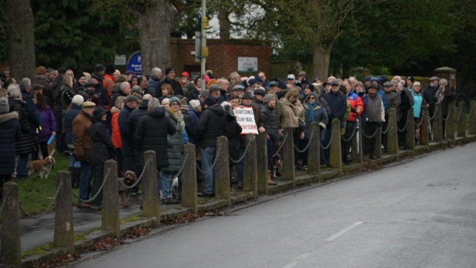 People gathering at The Rock junction for a protest 