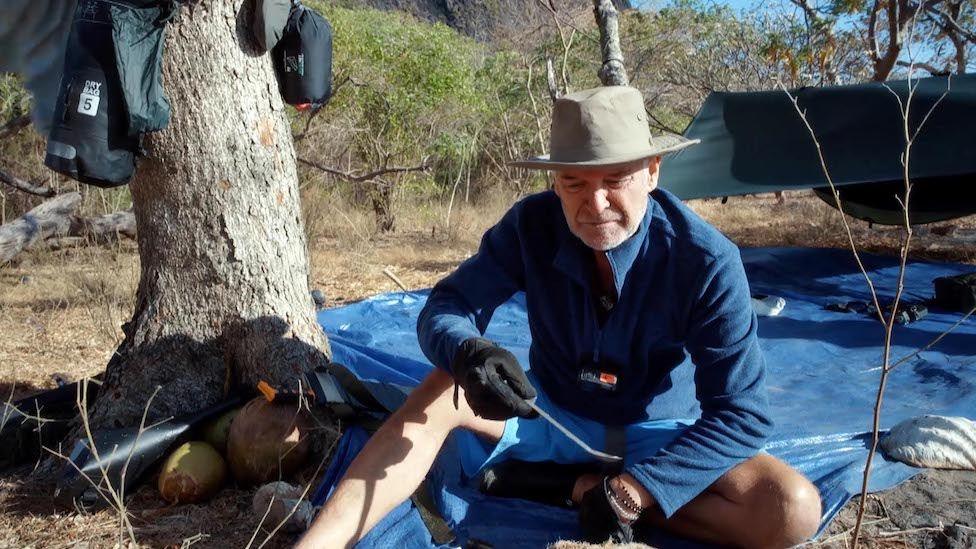 Schofield cooking on the island