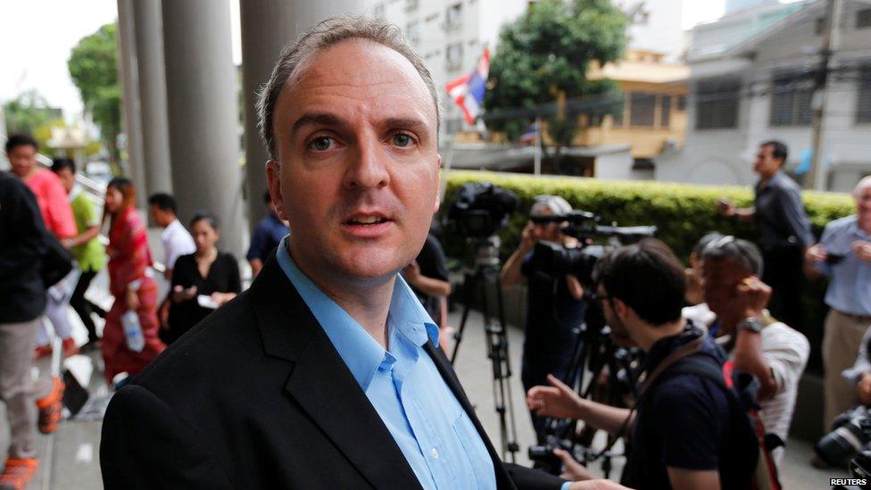 British rights activist Andy Hall leaves the Bangkok South Criminal Court