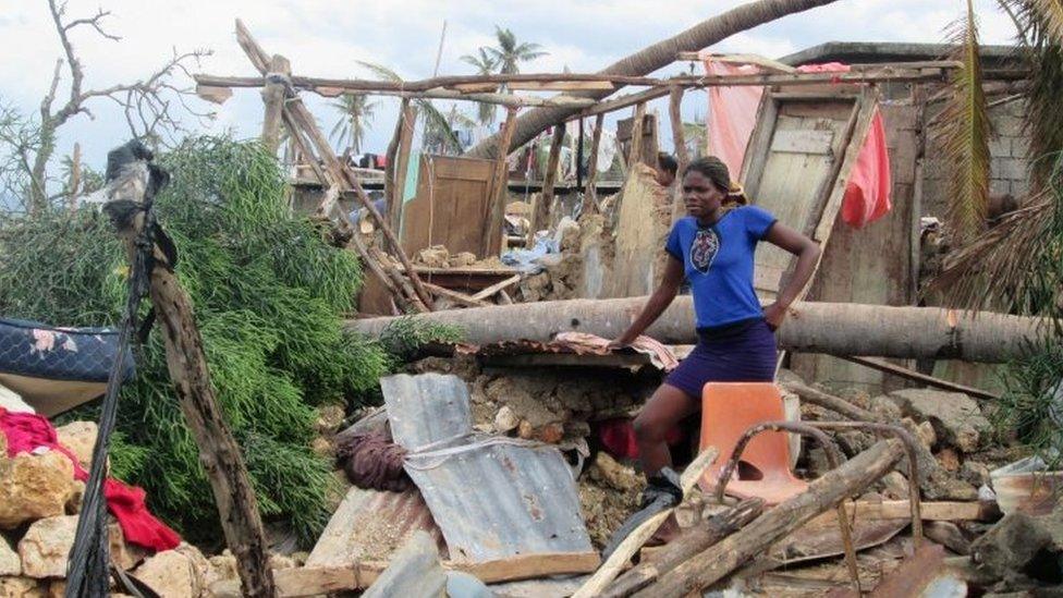 A woman looking on in the devastated town of Jeremie, west Haiti, on 7 October