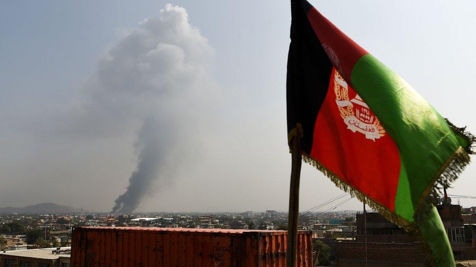 Smoke rises from the site of an attack after a massive explosion the night before near the Green Village in Kabul on September 3, 2019