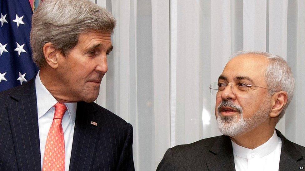 John Kerry and Mohammad Javad Zarif stand next to each other at nuclear talks in Lausanne, Switzerland (16 March 2015)