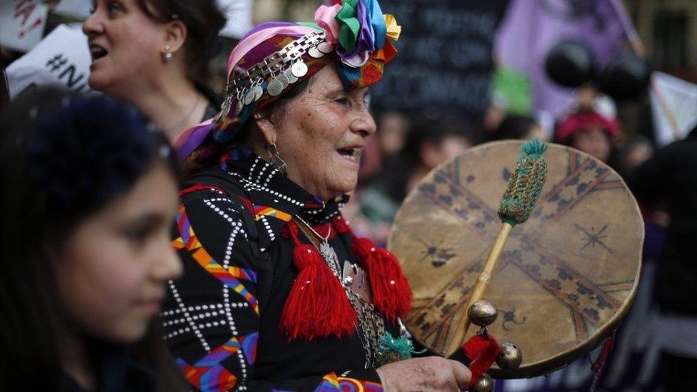 A group of women participate in a protest against gender violence in Santiago, Chile, 19 October 2016