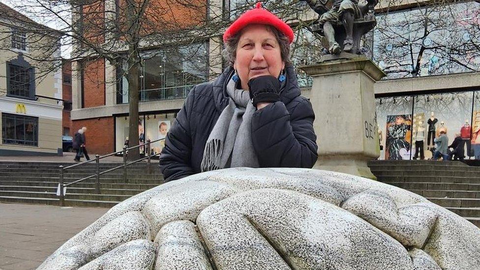 Marion Caitlin and Norwich brain statue