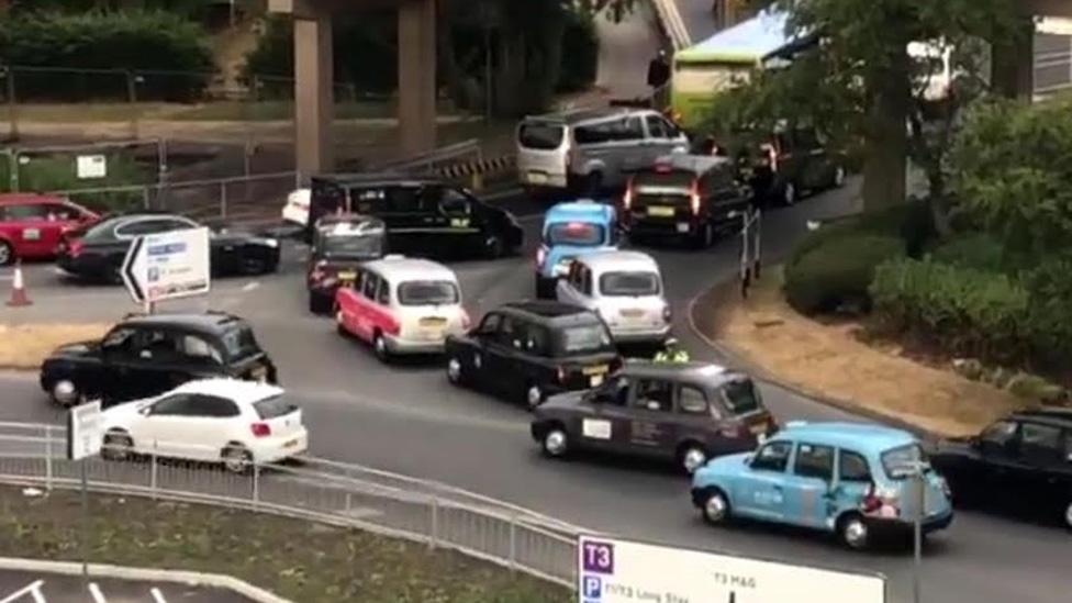 Taxis blocking road