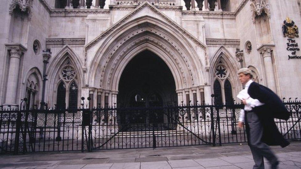 Barrister walking past a court