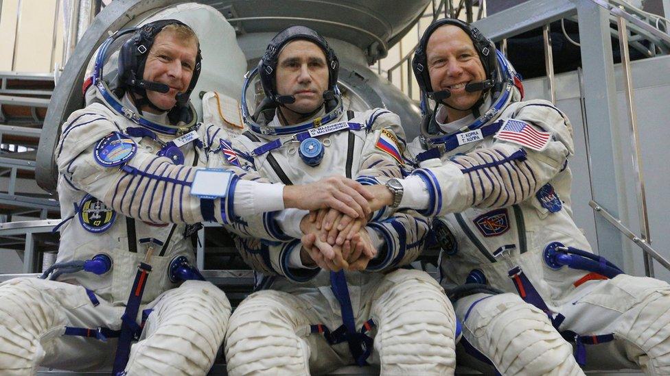 British ESA astronaut Timothy Peake, Russian cosmonaut Yuri Malenchenko and US NASA astronaut Timothy Kopra