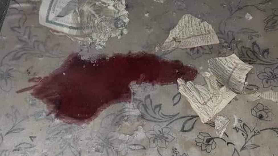 Photograph posted online by Mareb Press website a bloodstained carpet at a religious school and mosque reportedly hit by a Houthi ballistic missile in al-Jawba district, Marib province, Yemen (1 November 2021)