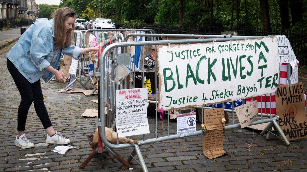 Protest posters outside the US Consulate General's office in Edinburgh