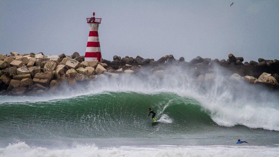 Jo Morris surfing