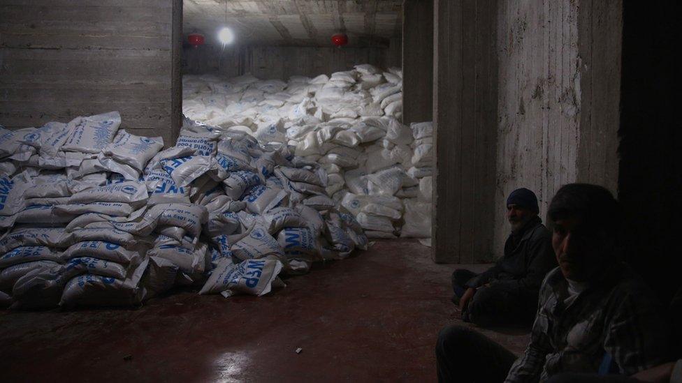 Sacks of WFP aid at a warehouse in Kafr Batna, a rebel-held suburb of Damascus (23 February 2016)