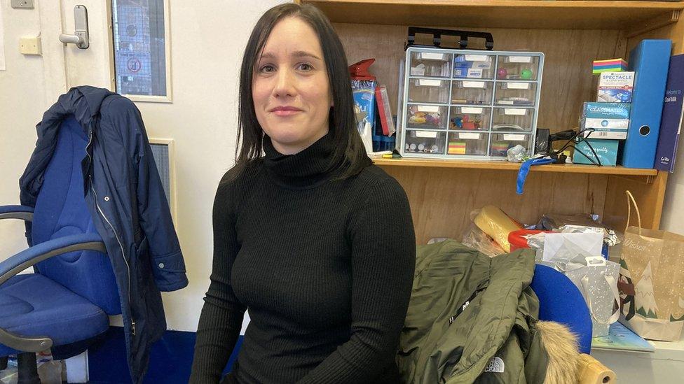 Hailey Mills looking at the camera in her office in the nursery