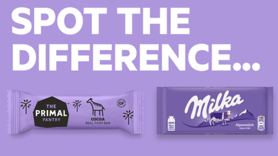 The Primal Pantry's bar and a Milka chocolate bar