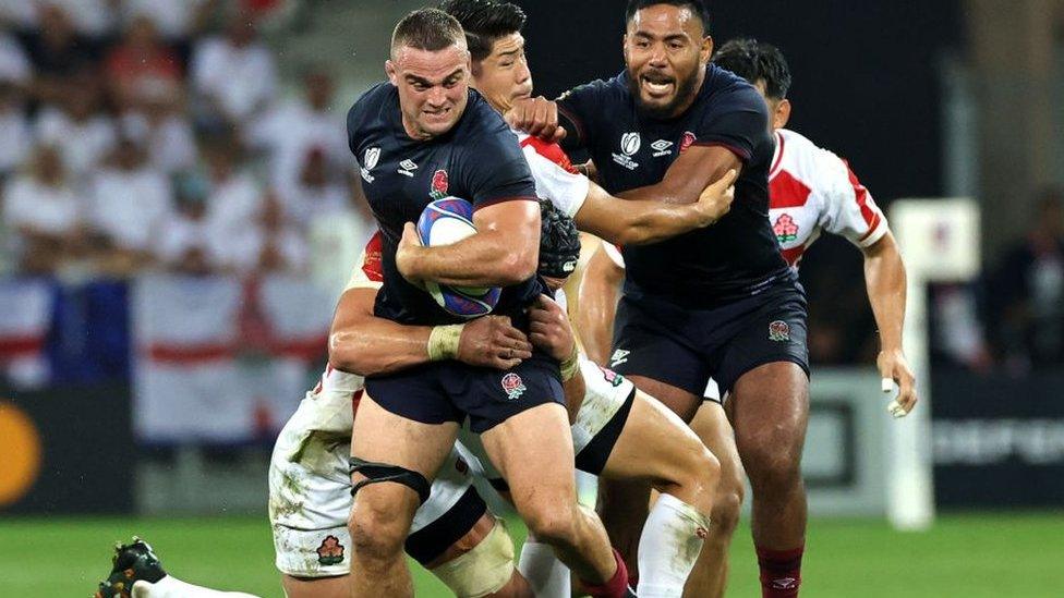 Ben Earl carries the ball for England against Japan