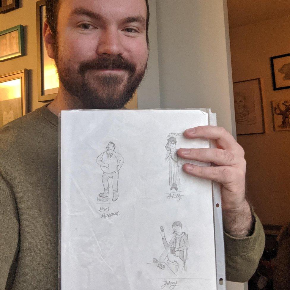 James Kunert-Graf with his original sketch, including Johnny Fiveaces