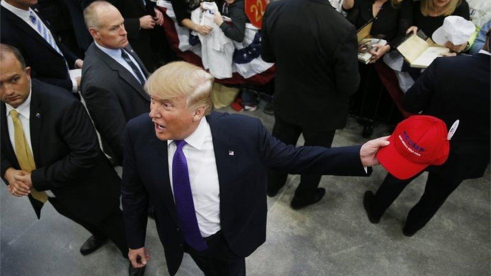 Donald Trump reacts while meeting with supporters at a campaign rally Monday, Feb. 22, 2016, in Las Vegas