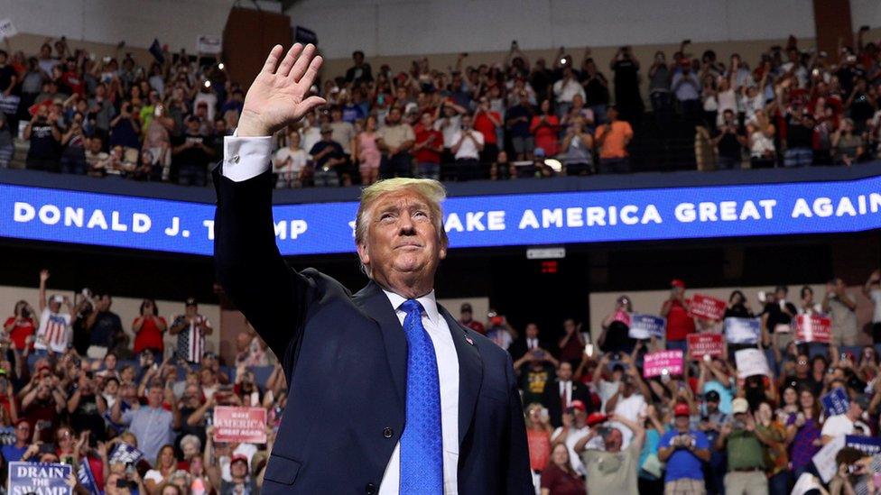 President Donald Trump rallies supporters during a Make America Great Again rally in Southaven, Mississippi, 2 October 2018