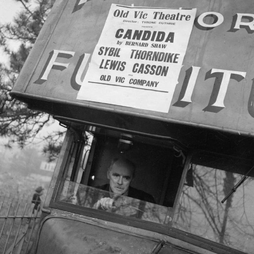 Actor Lewis Casson driving the furniture van that transported scenery on tour