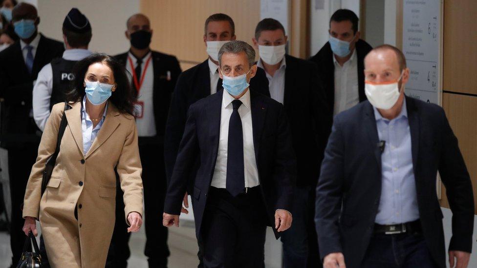 Former French President Nicolas Sarkozy arrives with his lawyer Jacqueline Laffont to attend his trial