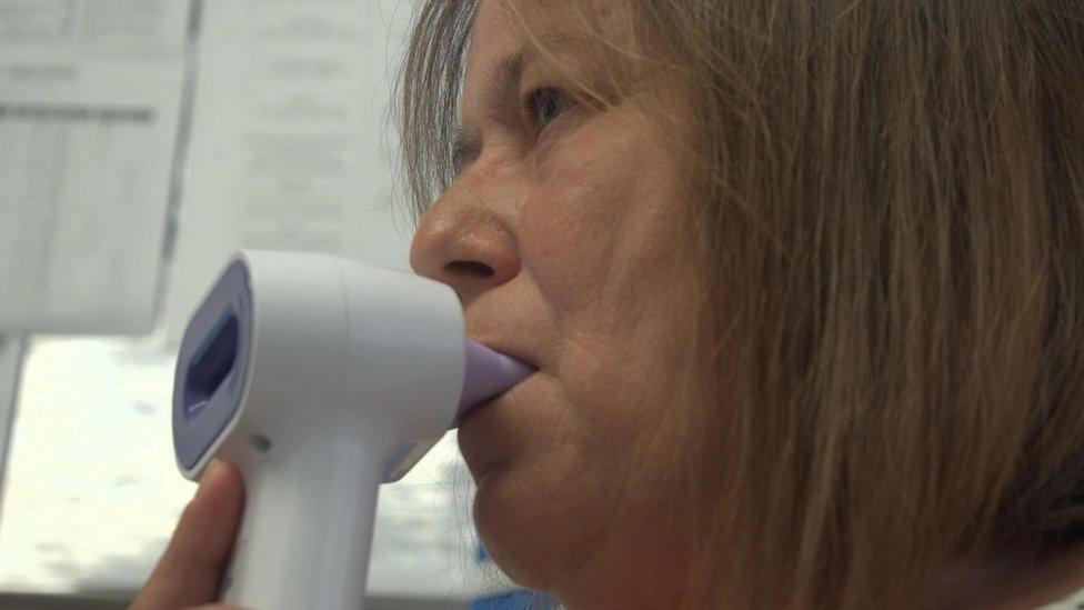 Patient using the N-Tidal device