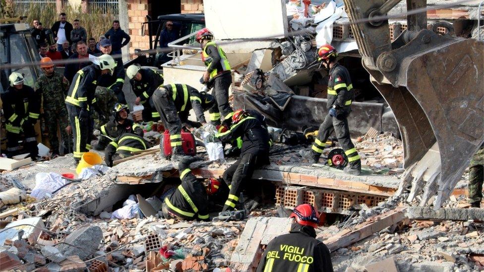 Rescue teams from Italy search for bodies in the rubble of a building in Durres, Albania, 27 November 2019