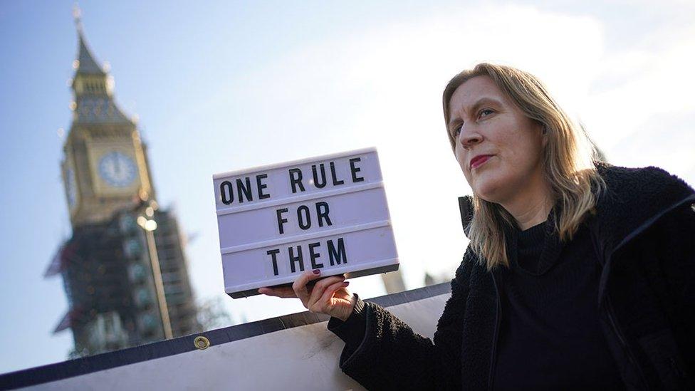 A protestor in Parliament Square in Westminster, London, 12 January 2022