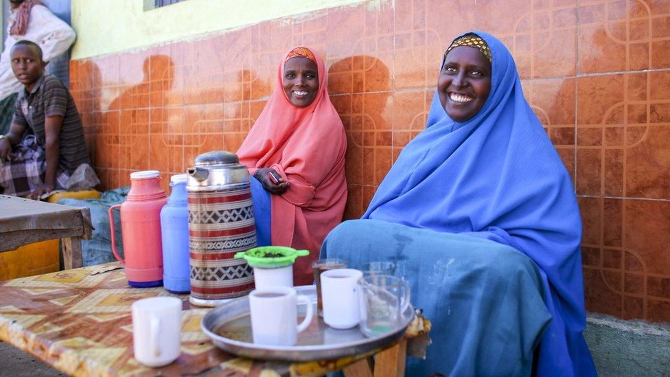 Women sell tea in the town of Buur-Hakba, Somalia