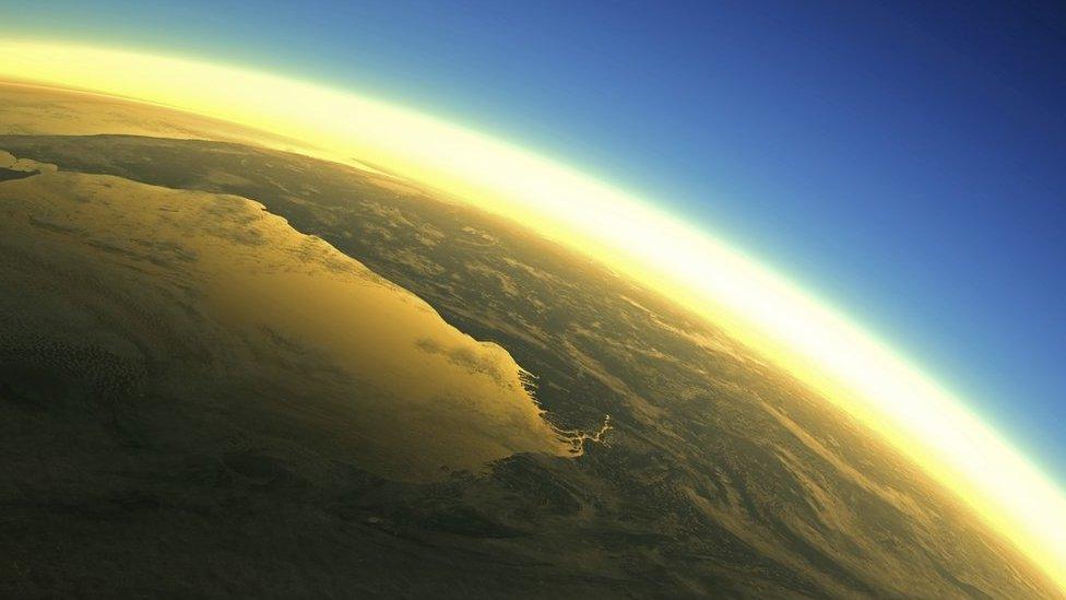 Earth with its atmosphere from space