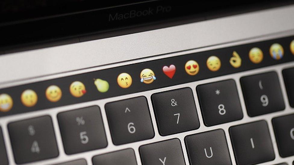 The Touch Bar on a new Apple MacBook Pro laptop (27 October 2016)