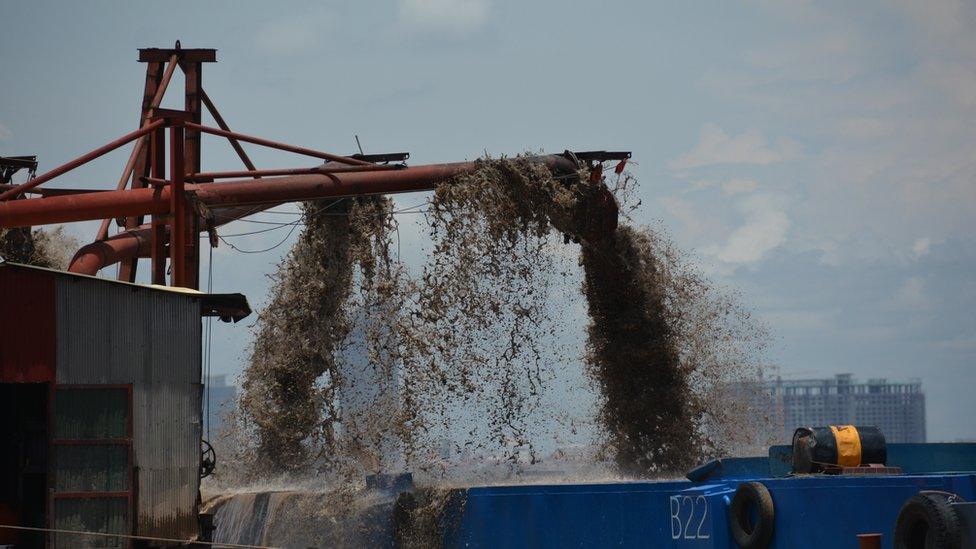 Sand being removed from the Mekong River in Phnom Penh, Cambodia.