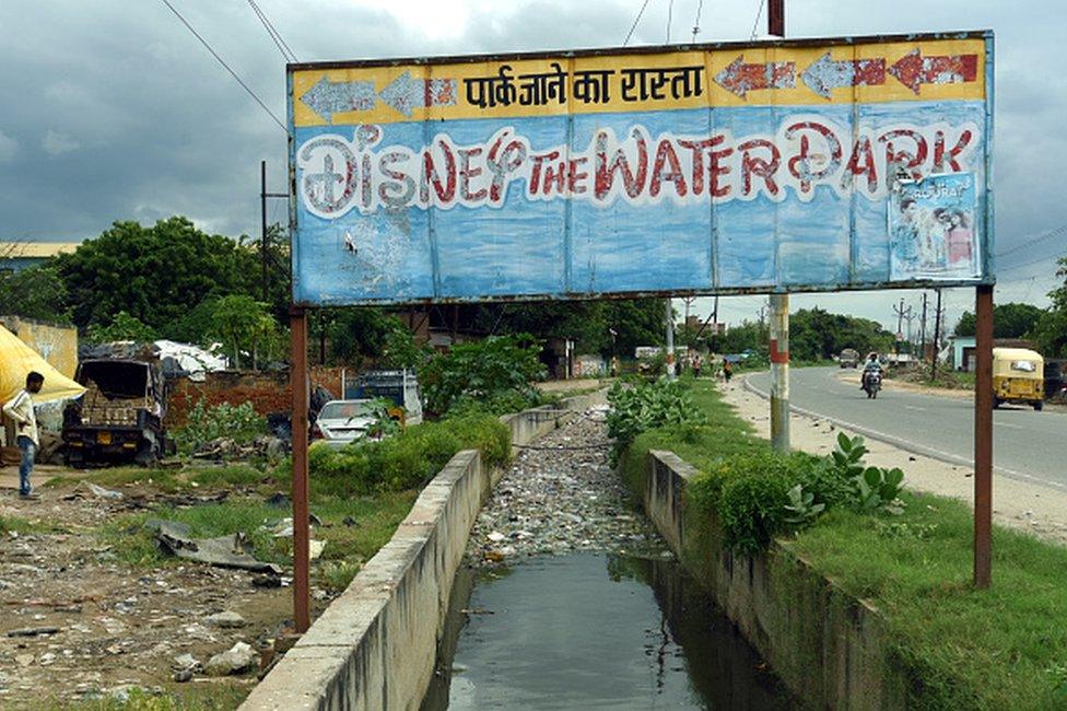 Plastic waste and garbage overflowing on an open drain at Deemadai village, on September 16, 2021 in Firozabad, India