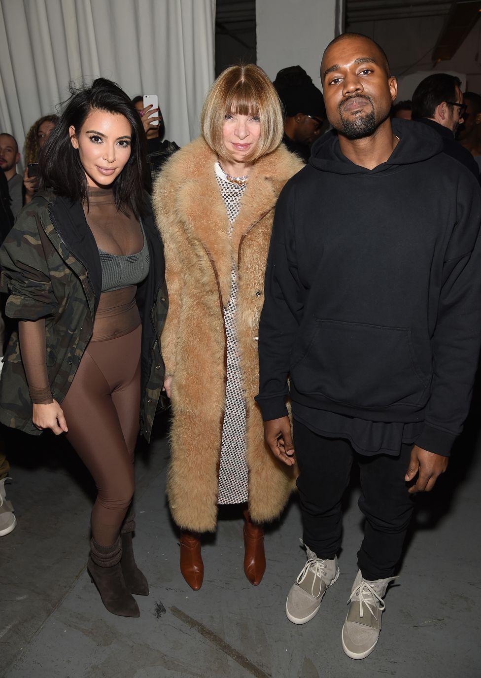 Kim Kardashian, Anna Wintour, and Kanye West pose backstage at the adidas Originals x Kanye West YEEZY SEASON 1 fashion show during New York Fashion Week Fall 2015 at Skylight Clarkson Sq on February 12, 2015 in New York City.