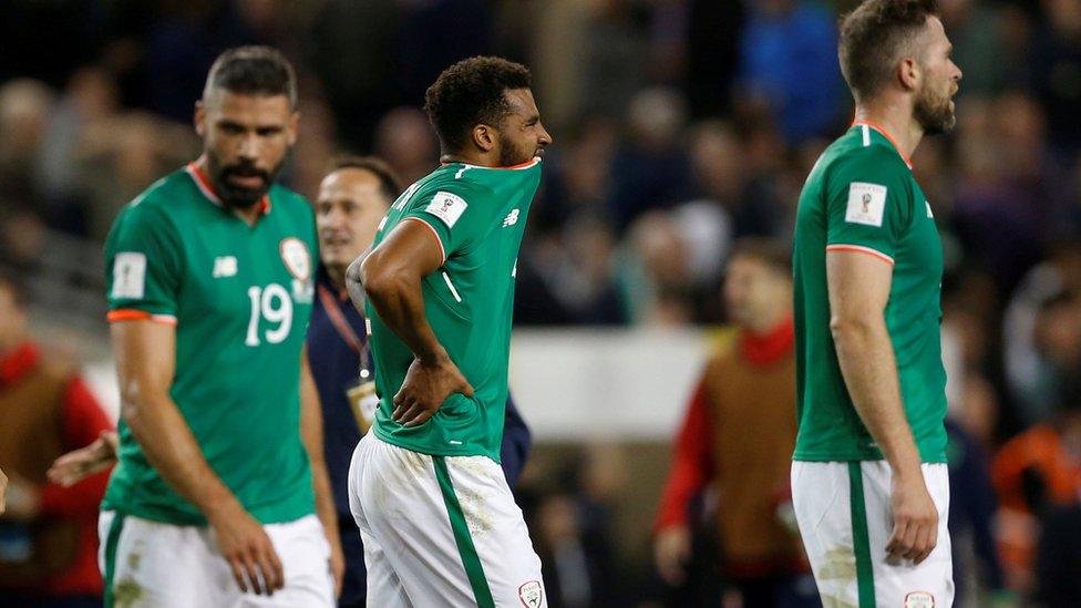 Dejected Republic of Ireland players after the defeat to Serbia