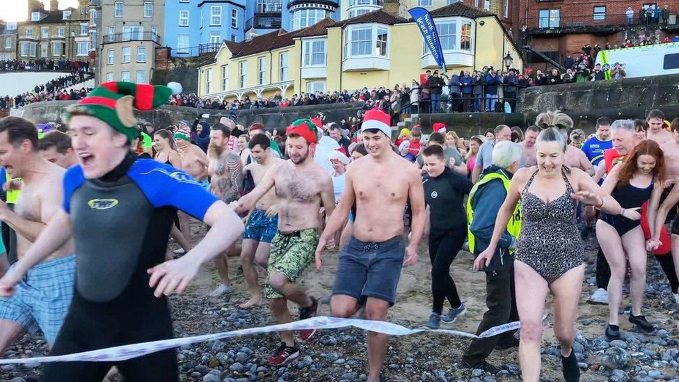 People take part in Cromer dip 2017