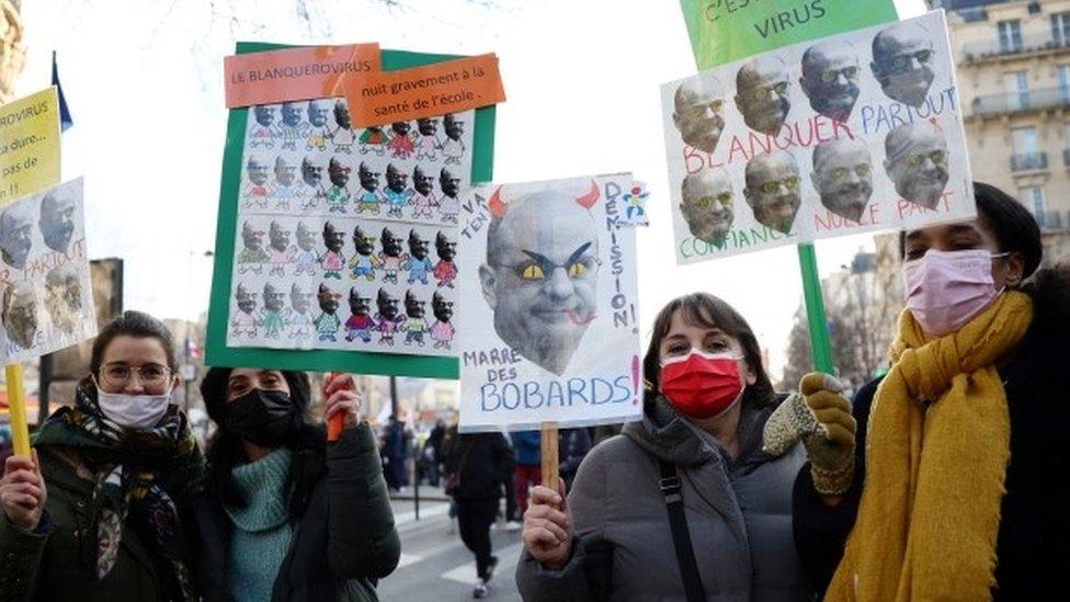 French teachers attend a demonstration as part of a nationwide day of strike and protests against sanitary conditions in schools