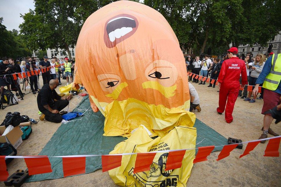 A "Baby Trump" balloon is inflated in London's Parliament Square