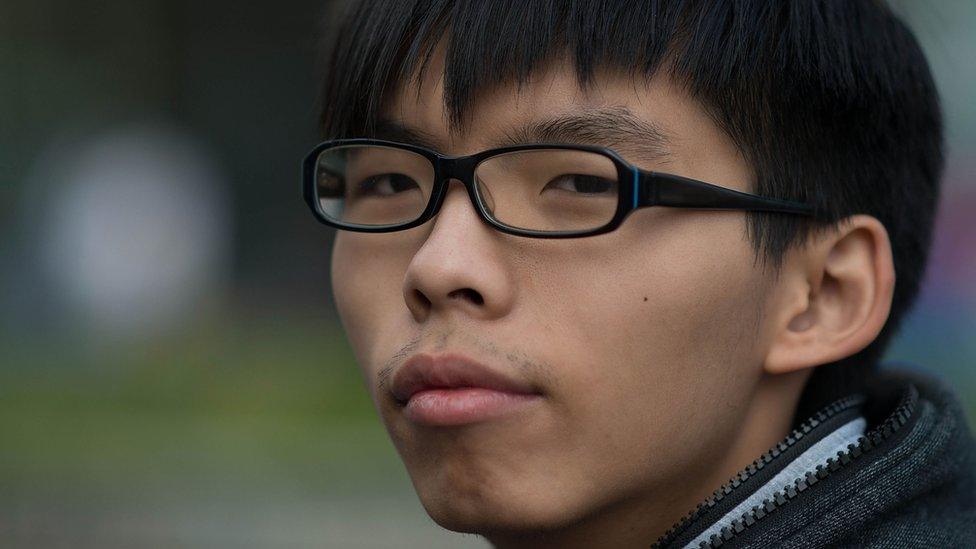 Joshua Wong on a street outside of Citic Tower on 18 November 2014 in Hong Kong.