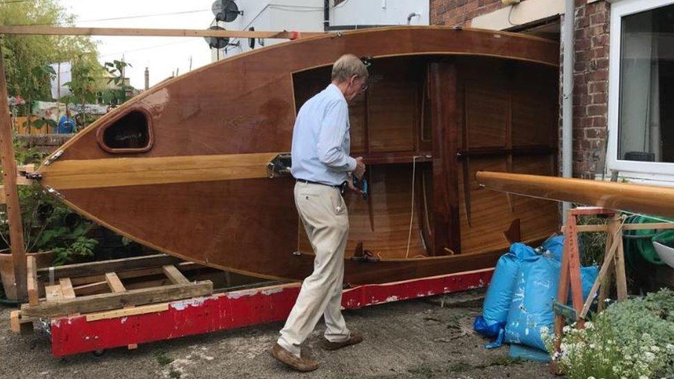 Steve Goodchild with his boat in the patio