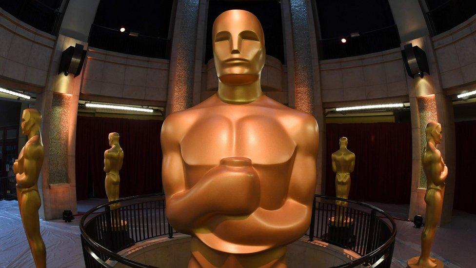 An Oscars statue stands at the end of the red carpet arrivals area ahead of the 89th annual Oscars at the Dolby Theatre in Hollywood, California