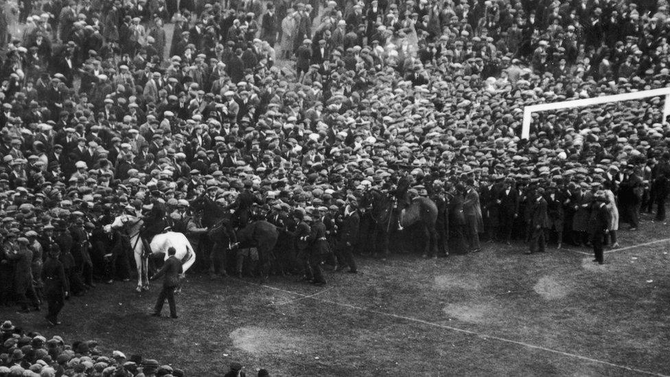 Horse trying to contain crowd during 1923 FA Cup Final