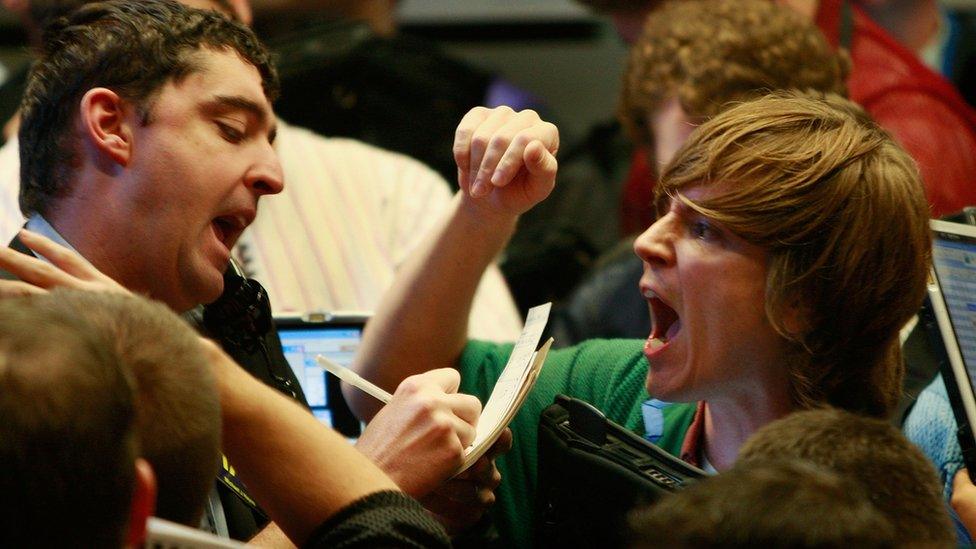 Men shouting orders a the Chicago Board Options Exchange